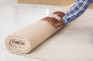 Remove all rugs that could cause someone to slip or fall.