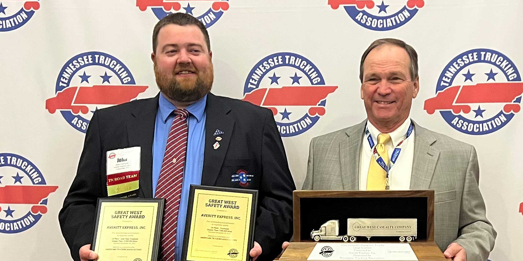 Clarksville Truckload driver John Tetreault (left) and Averitt Director of Safety and Compliance John Walton (right) show several awards from the Tennessee Trucking Association convention. Averitt was honored as the TTA’s 2022 Grand Champion, and it also won the First Place Truckload Safety, First Place LTL Safety and Clean Diesel awards.